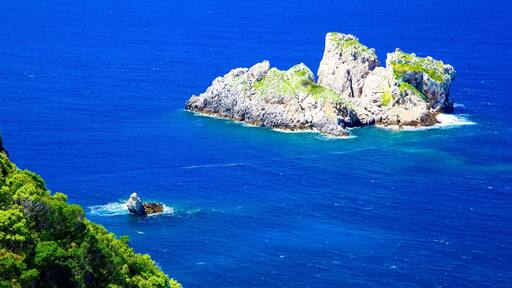 Paleokastritsa Beach featuring island views