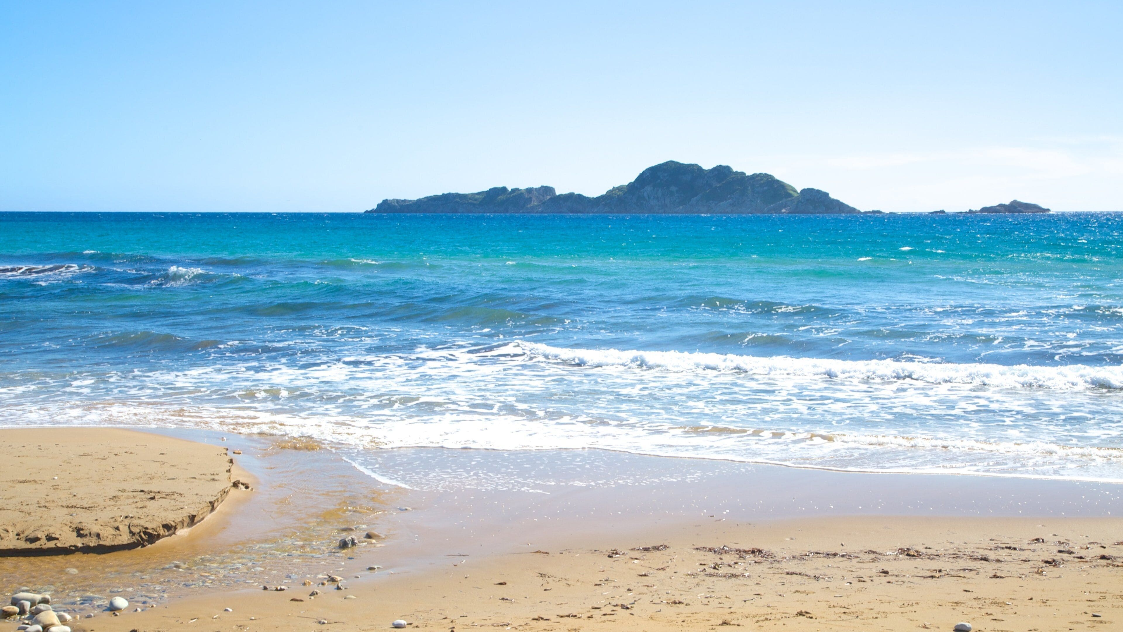 Arillas Beach which includes landscape views and a beach