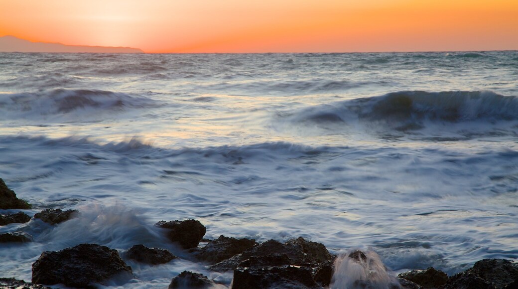 Logas Beach showing a sunset and general coastal views