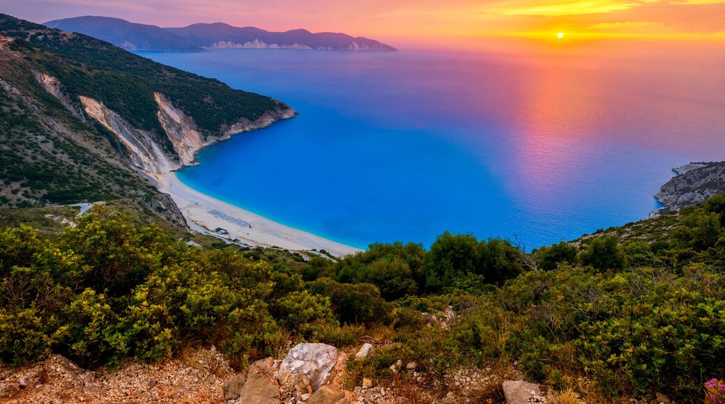 Beautiful summer sunset on Mirtos beach in Greece