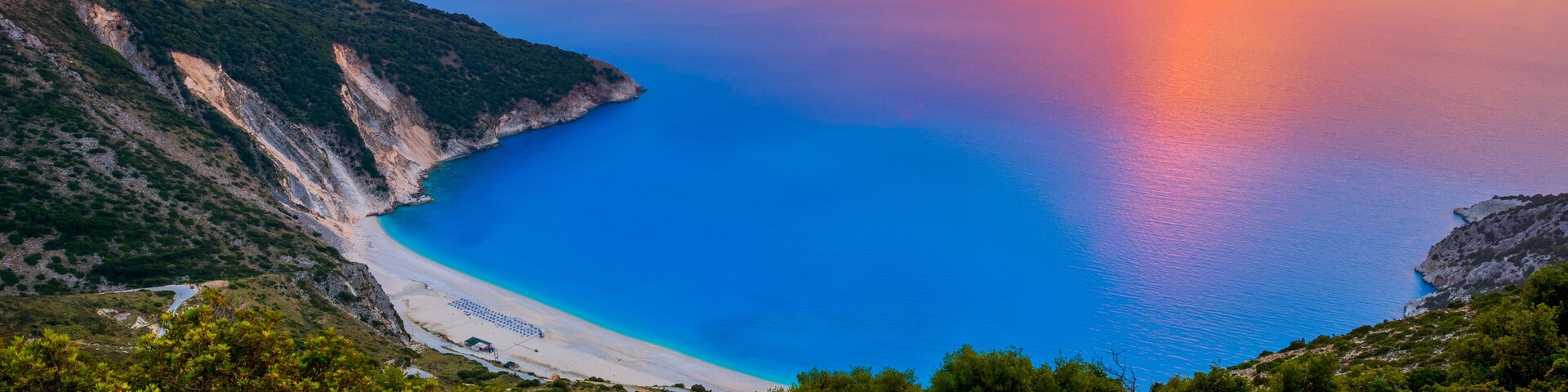 Beautiful summer sunset on Mirtos beach in Greece