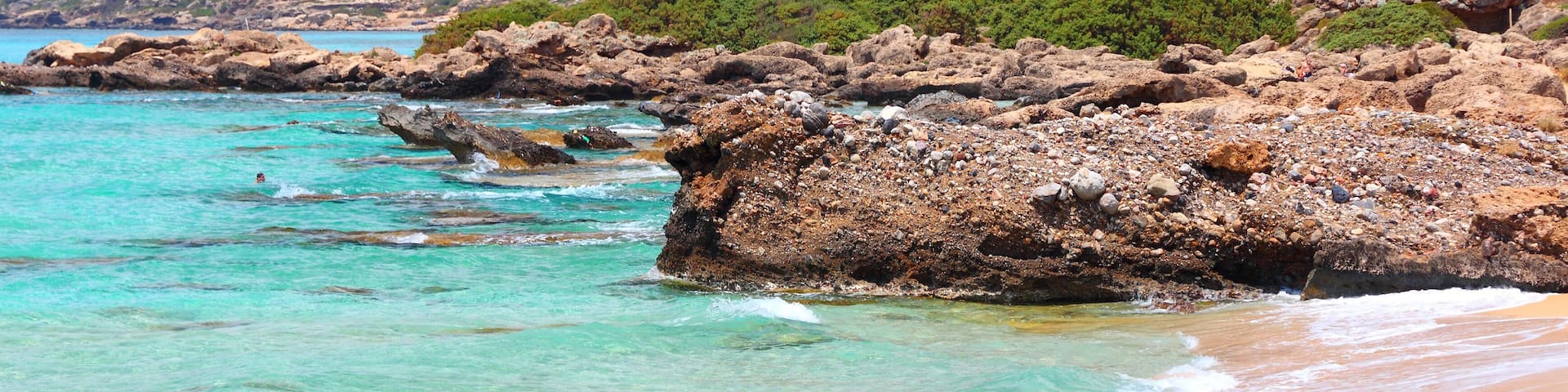 Coast of Crete island in Greece. Red sand beach of famous Falasarna (also known as Falassarna or Phalasarna)