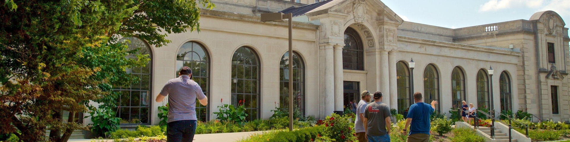 Iowa State University which includes heritage architecture and a park as well as a small group of people