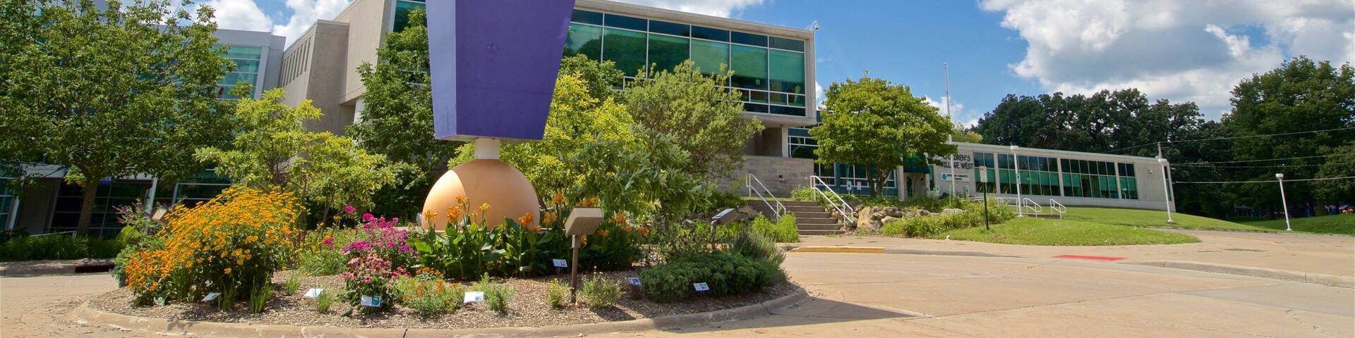 Putnam Museum which includes signage and a garden