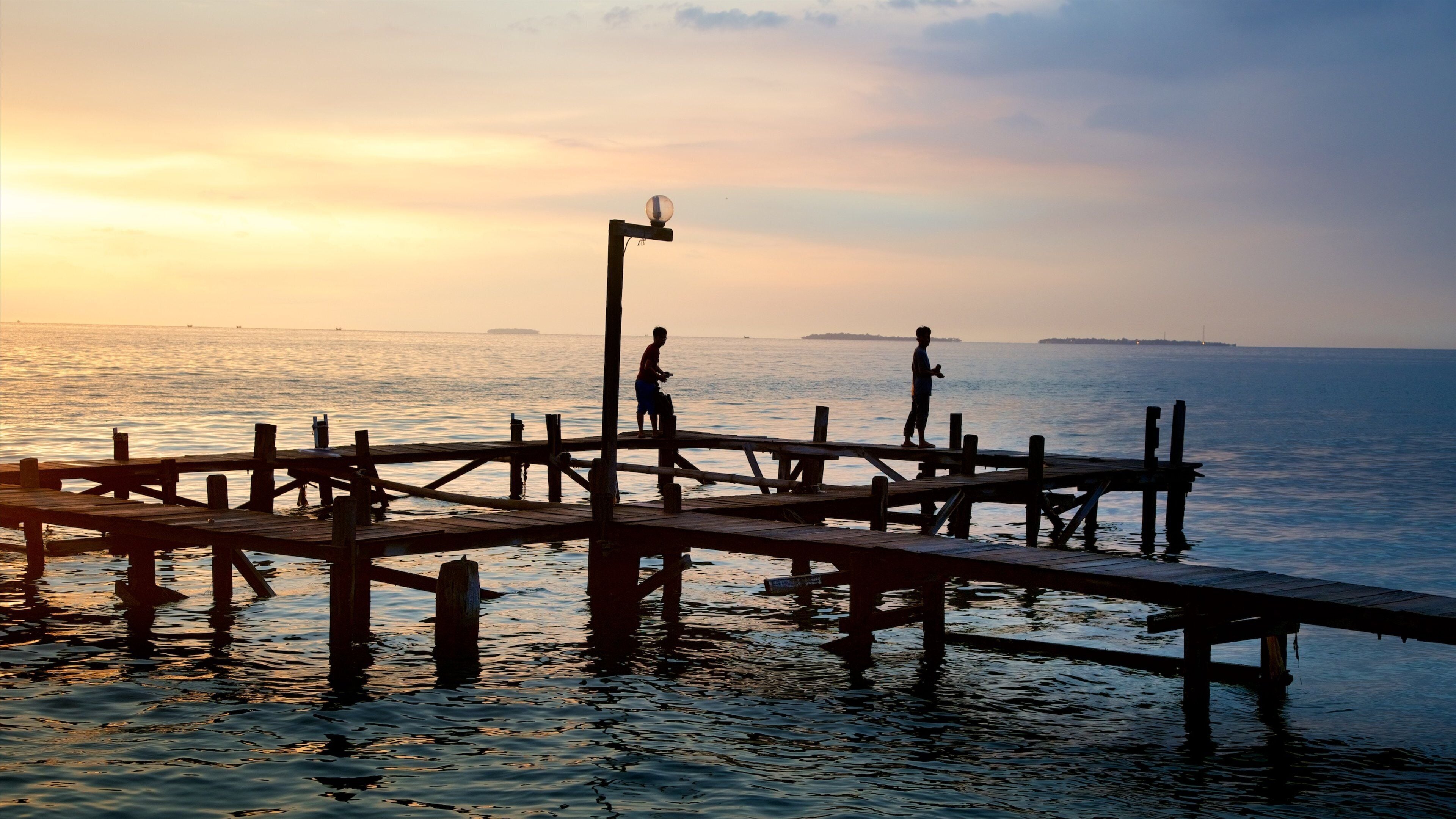 Kepulauan Seribu National Park featuring general coastal views and a sunset