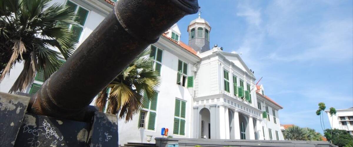 Jakarta History Museum featuring military items and a city
