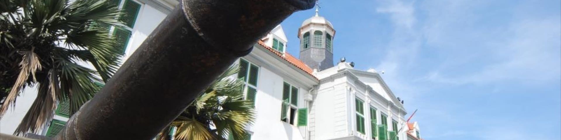 Jakarta History Museum featuring military items and a city