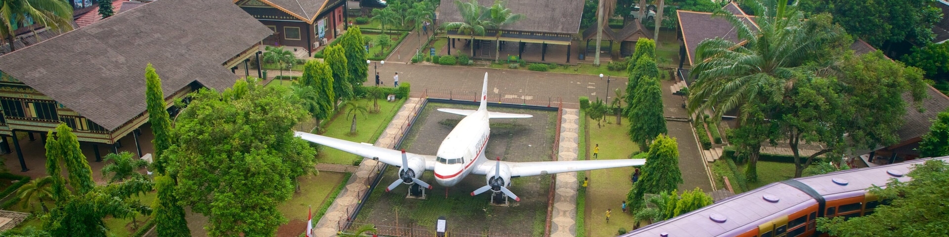 Taman Mini Indonesia Indah which includes landscape views and railway items