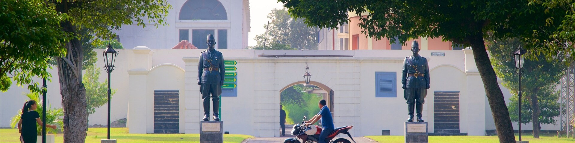 Fort Vredeburg Museum showing motorcycle riding and a square or plaza