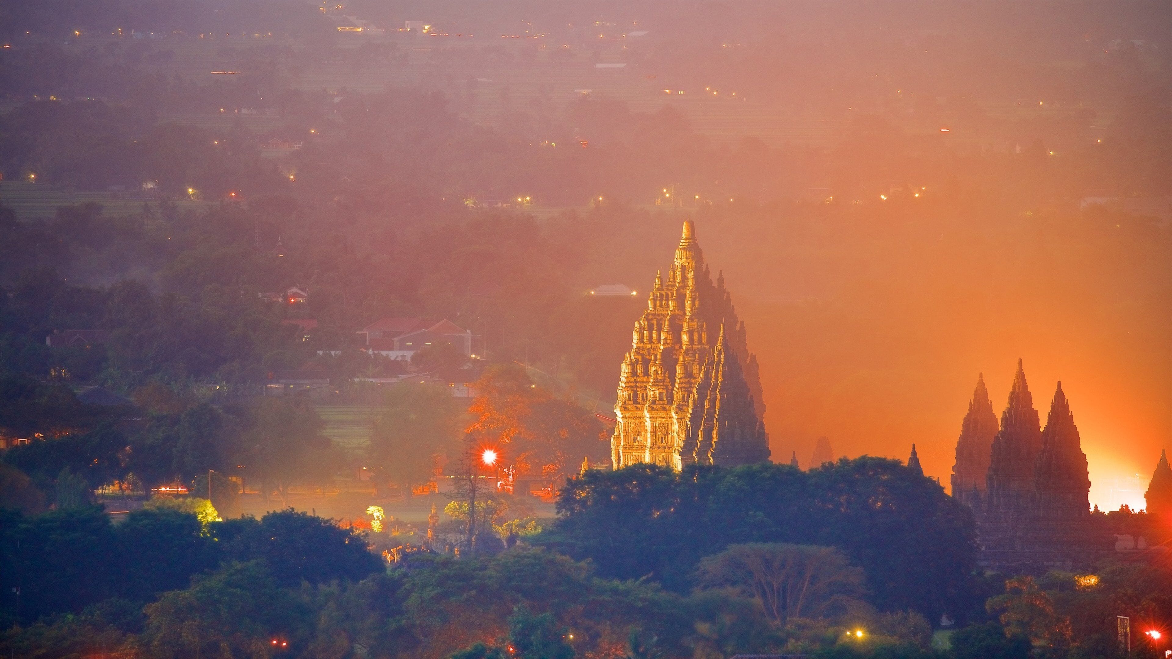 Prambanan Temple showing mist or fog, heritage architecture and night scenes