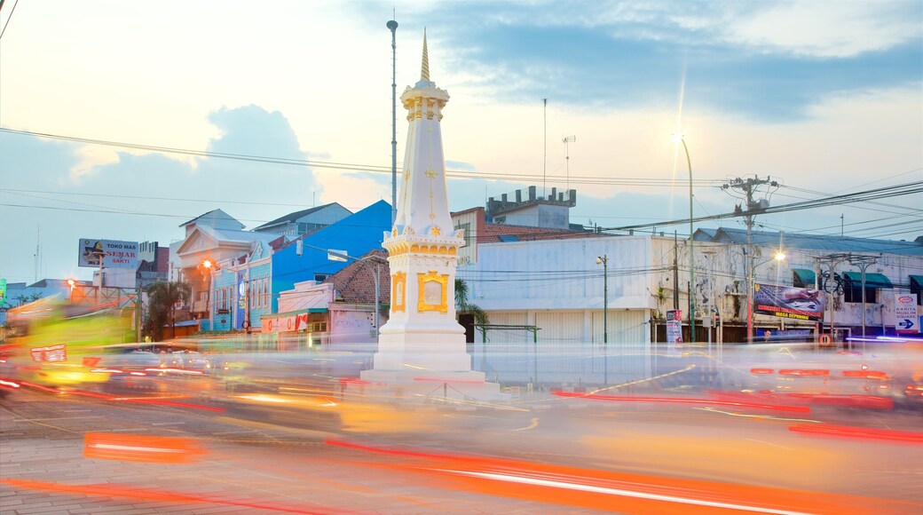 Tugu Monument featuring a sunset
