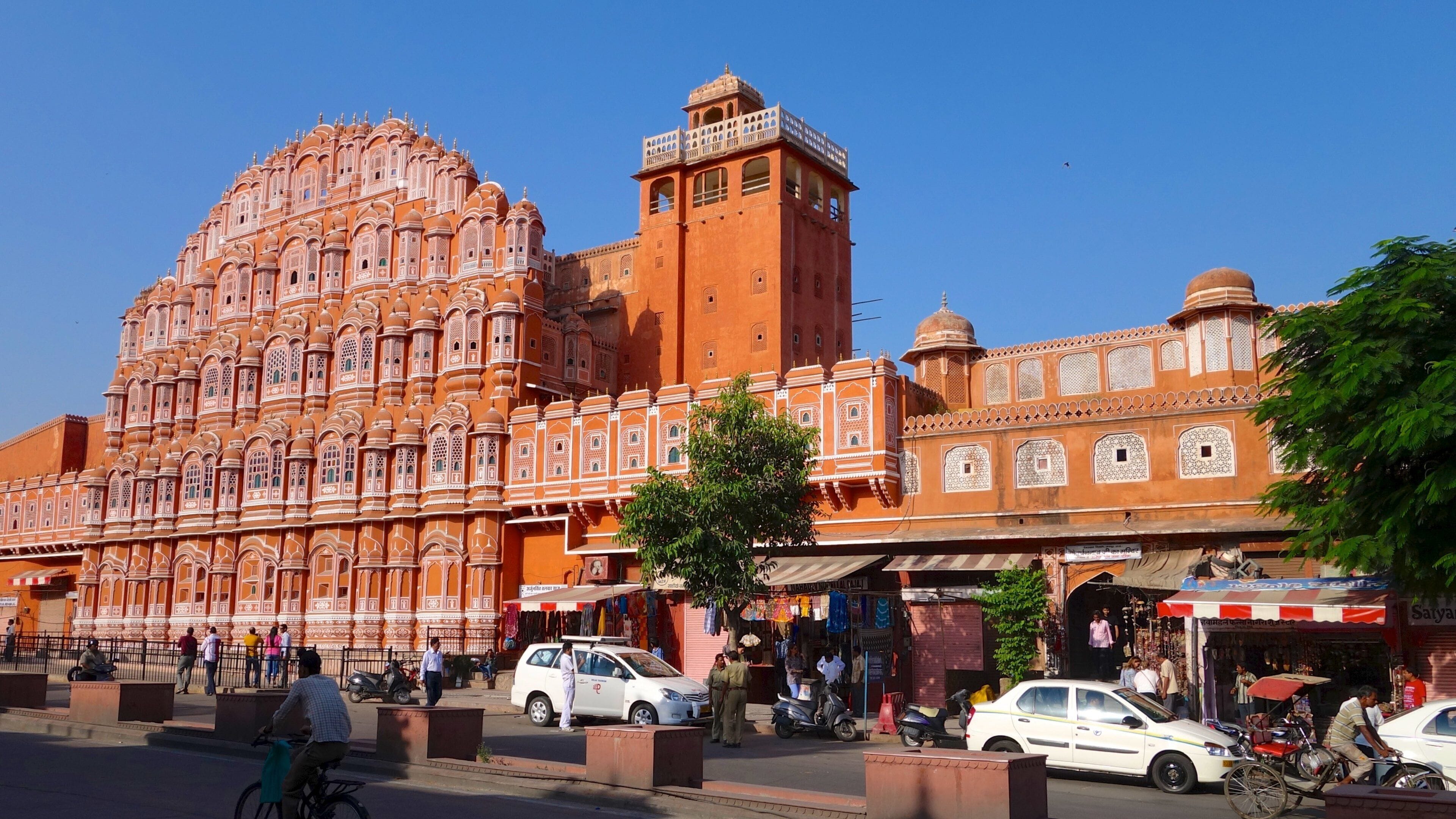 Hawa Mahal which includes street scenes, heritage architecture and a city