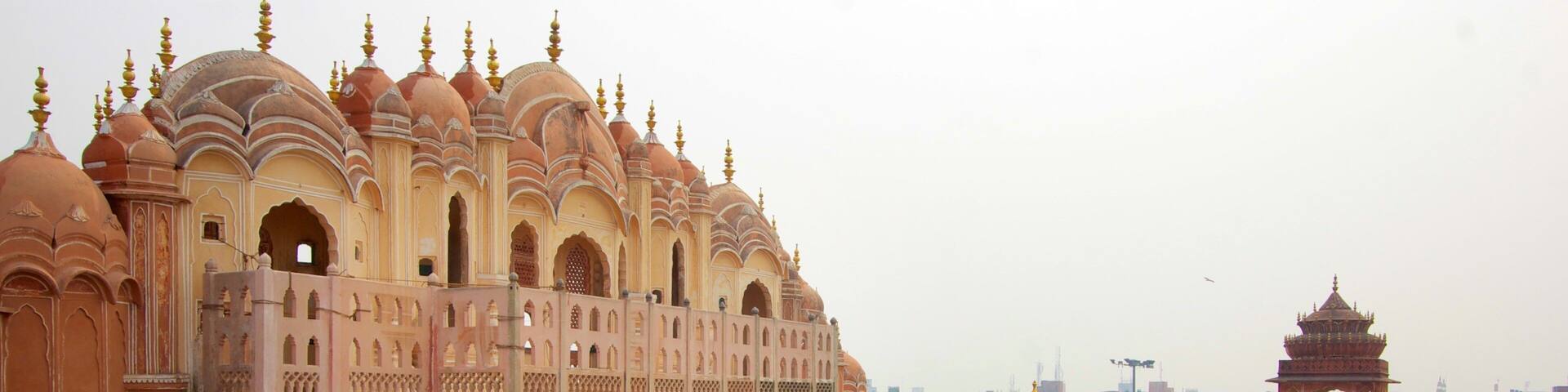 A historic building with ornate architecture, including domes and spires.