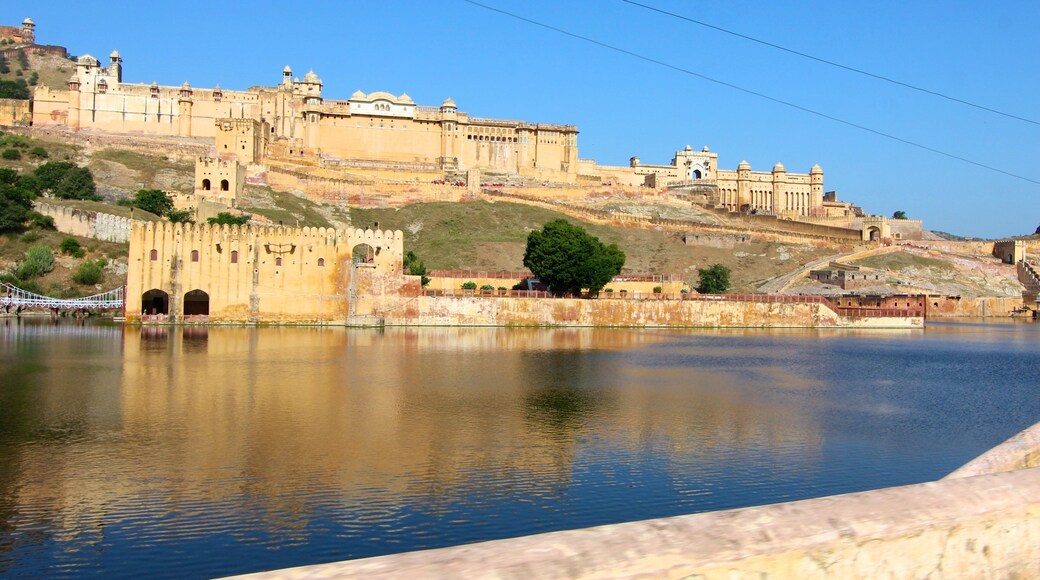 Amber Fort featuring a lake or waterhole and a castle