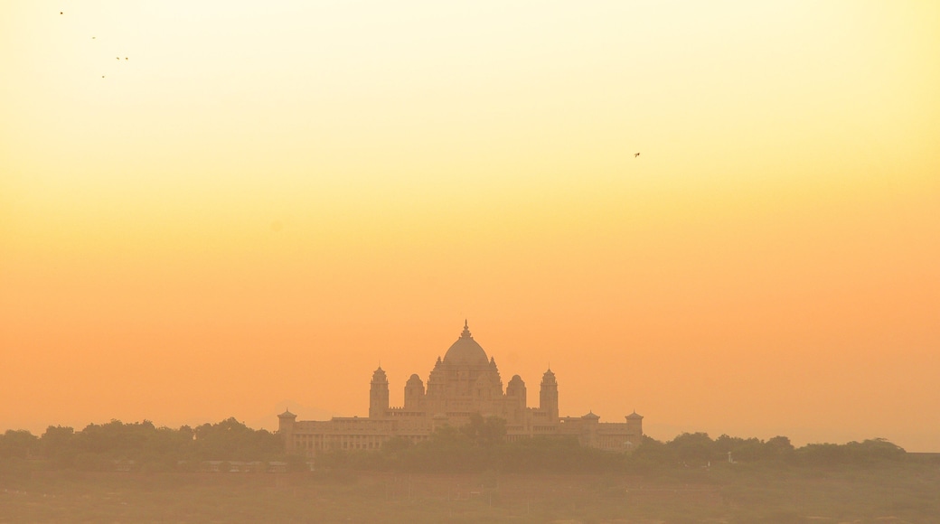 Umaid Bhawan Palace showing a sunset and chateau or palace
