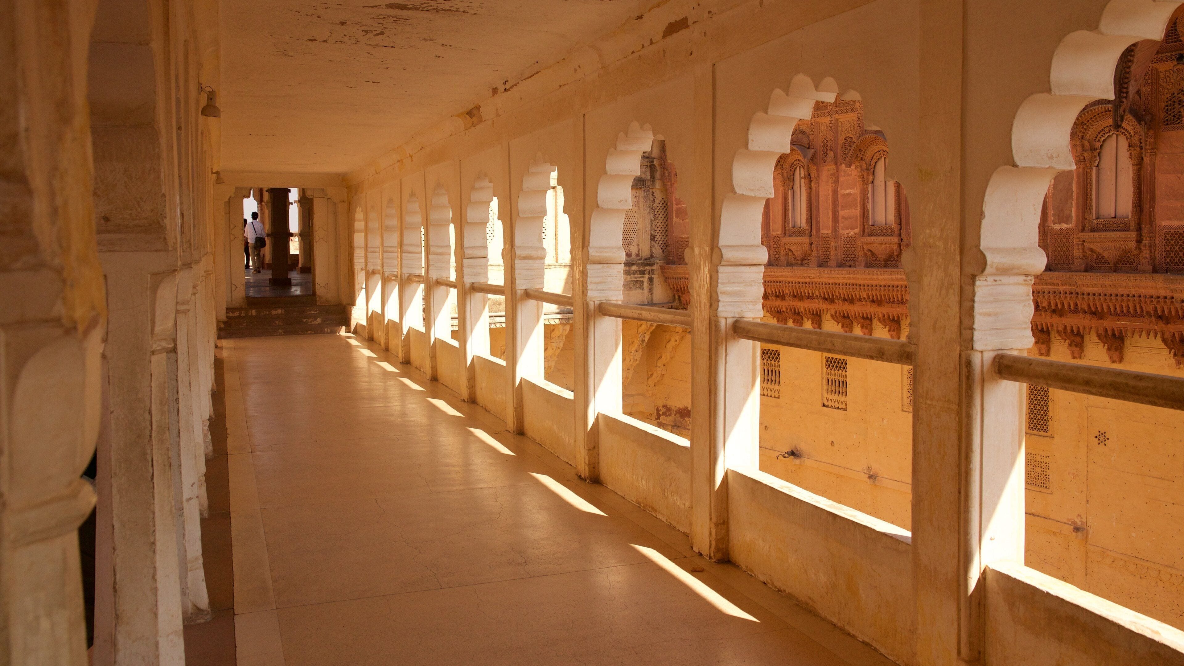 Mehrangarh Fort featuring a castle and interior views