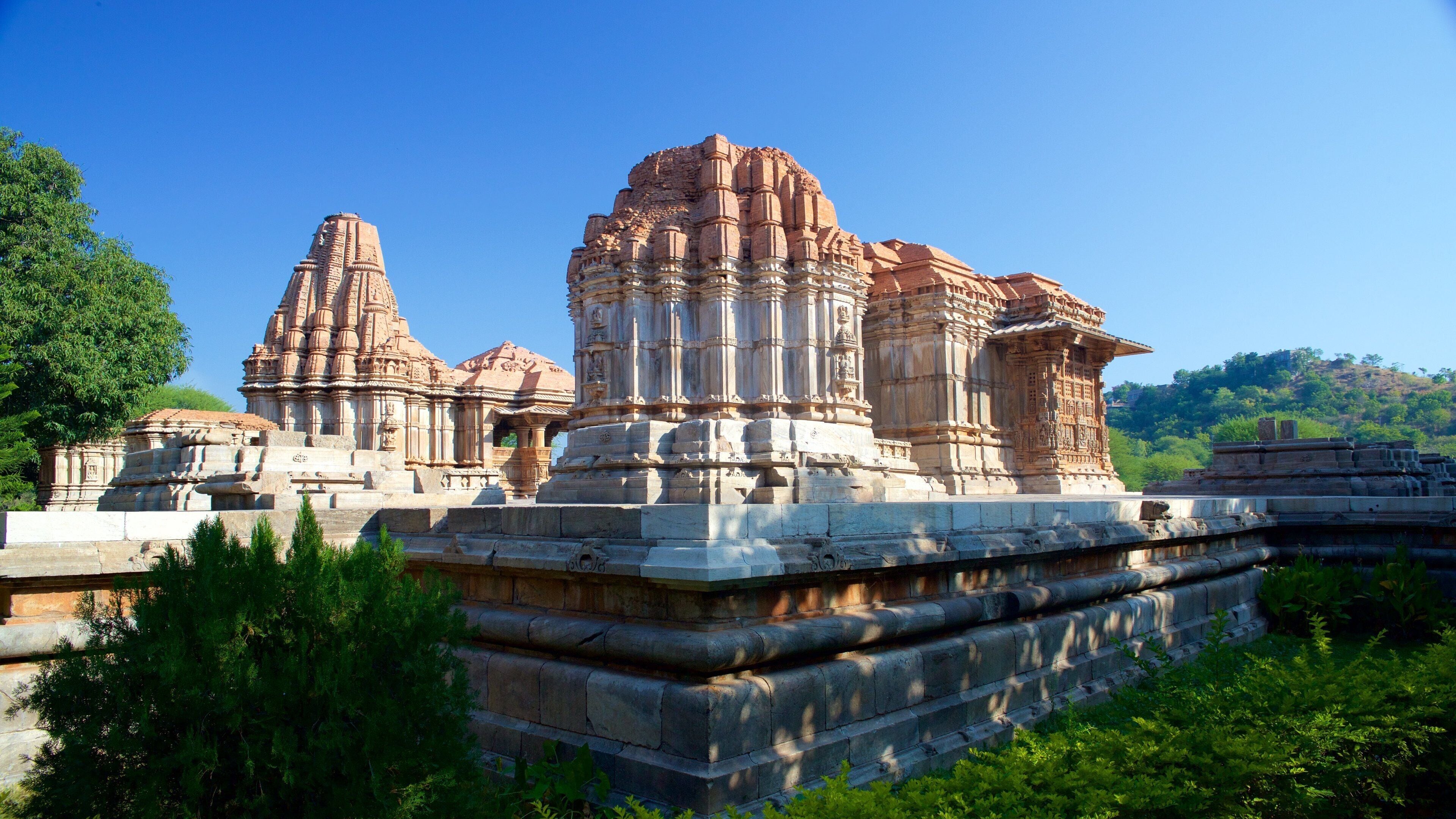 A temple complex with intricate carvings and tiered structures.