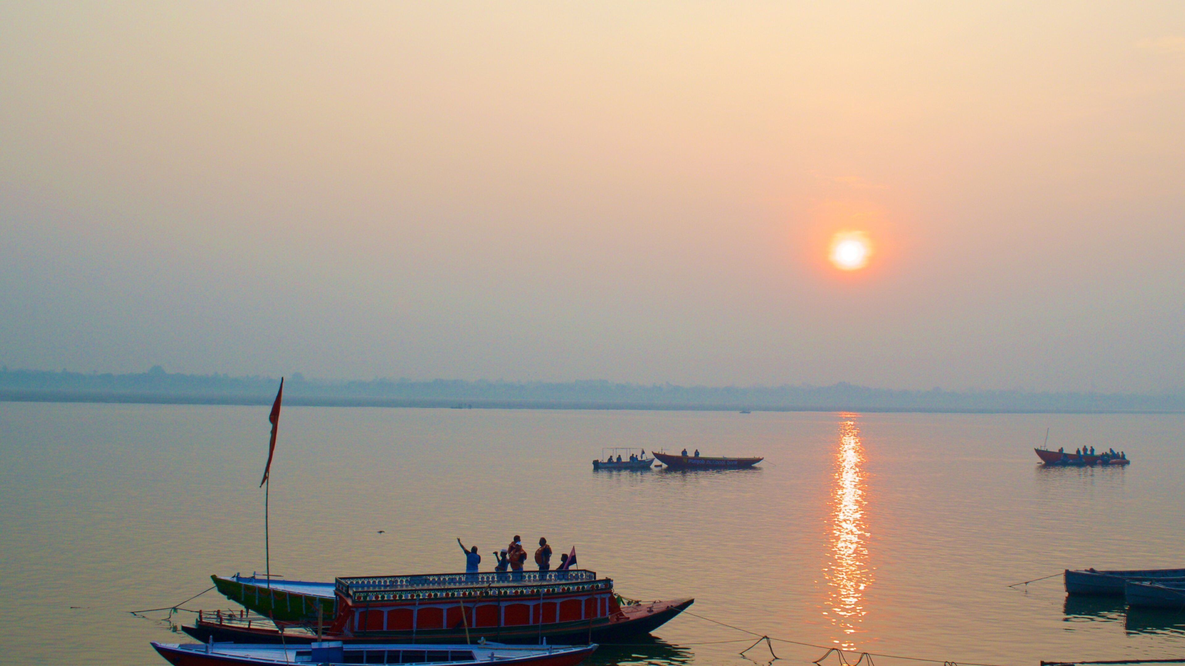 Tulsi Ghat which includes kayaking or canoeing, a sunset and boating