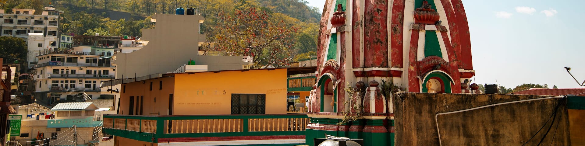 Beautiful sunny day and view on hindu temple in Rishikesh