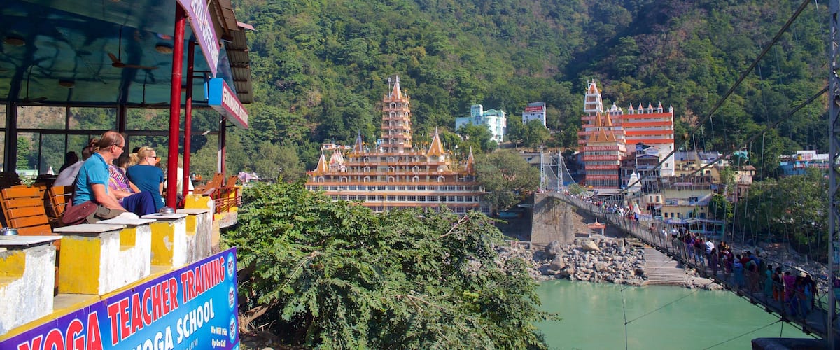 A yoga training school, a temple, and a suspension bridge over a river.
