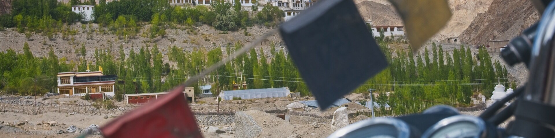 A SMALL VILLAGE WITH A HUGE HEART
A repeat visit to a region often means the opportunity to go a little deeper, to discover and be surprised. 
During my second visit to Ladakh I didn’t need to wander very far from Leh, the beating heart of Ladakh, to connect with a little village and its community as deeply as I did. 
From being introduced to one of the most pioneering education facilities I’ve seen to being invited to a gathering of the community, the little village of Phyang certainly has a lot going for it. 
At the end of my visit to the village I stopped along the way up to the local monastery which towers over Phyang and took a moment to take in a truly incredible view that remains imprinted in my memory from that day. 
#India #Ladakh #Phyang #Adventure