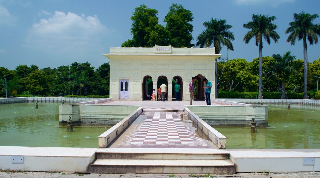 Yadavindra Gardens featuring a garden, a lake or waterhole and heritage architecture