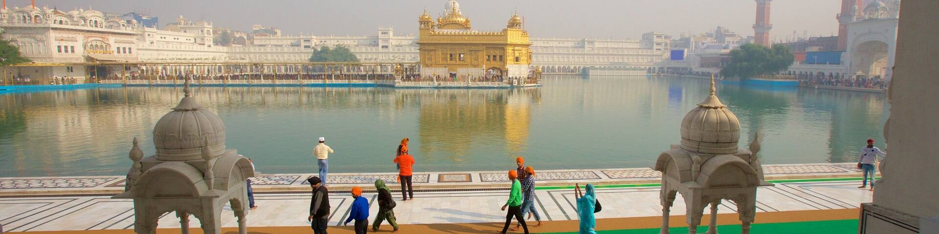 Golden Temple which includes a lake or waterhole, heritage architecture and heritage elements