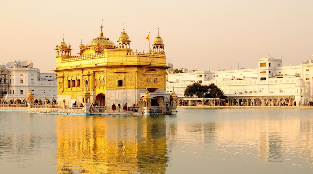 The golden temple of Sikh religion at sunset in Amritsar, Punjab, India.