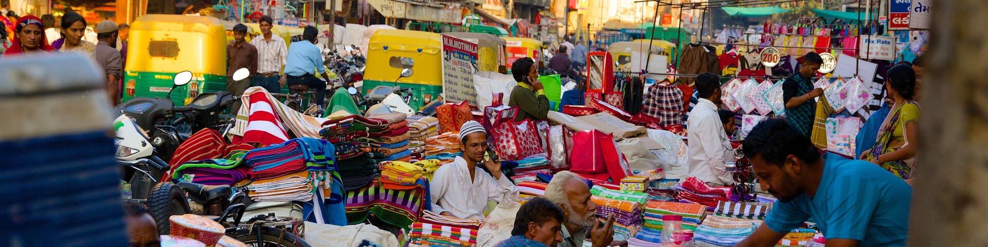 Manek Chowk showing markets and a city