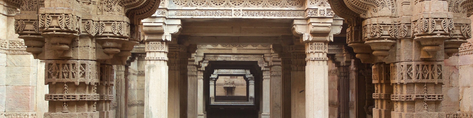 Adalaj Stepwell featuring a temple or place of worship, heritage elements and heritage architecture