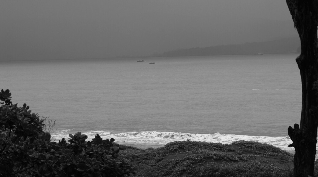 #AquaTrove The dinghy in the distant choppy waters off the monsoon battered western ghats of India.