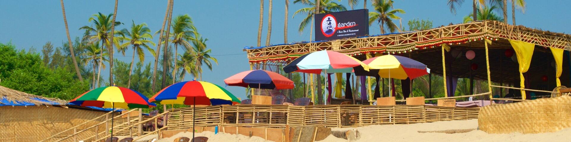 Mandrem Beach featuring a beach bar, a beach and general coastal views