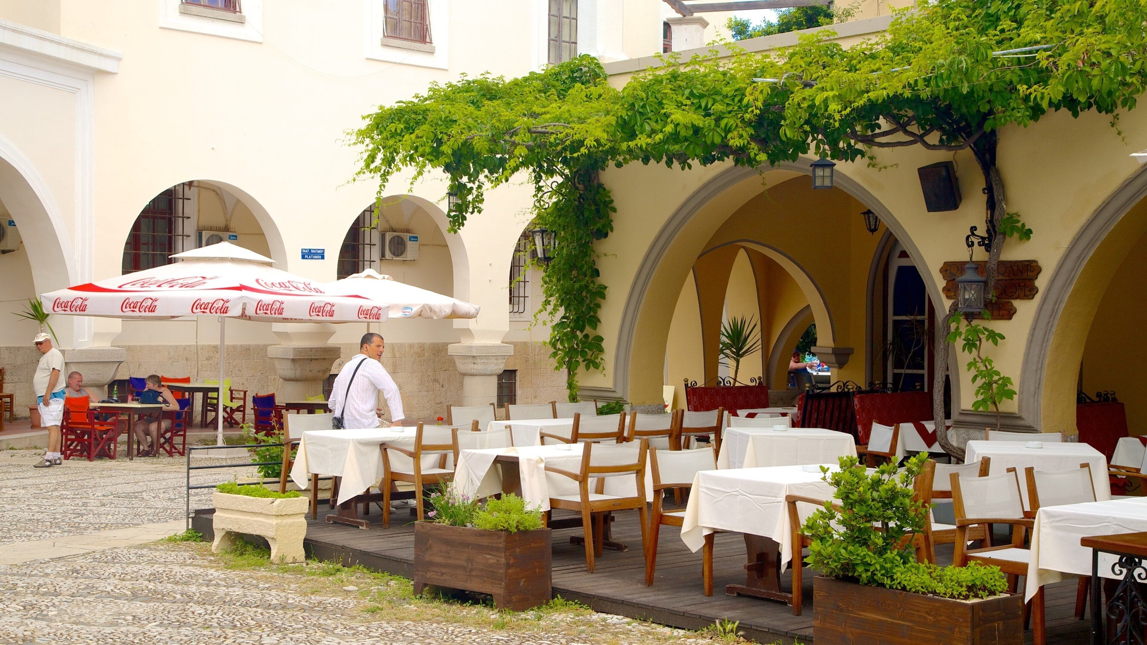 Tree of Hippocrates showing street scenes