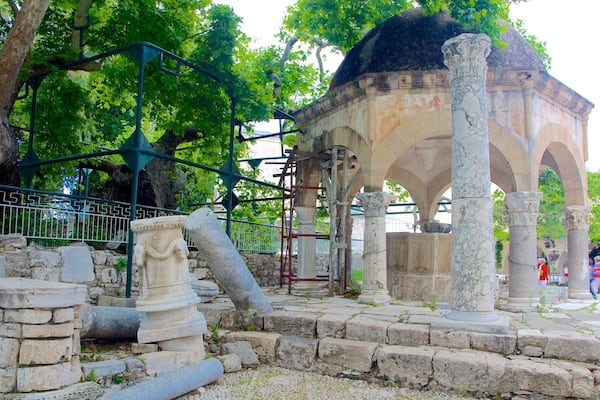 Tree of Hippocrates featuring heritage architecture and building ruins