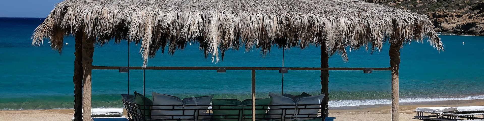 View of a giant luxury sun bed at the Papas beach in Ios Greece