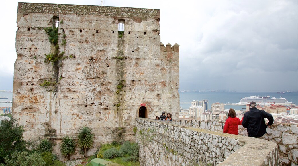 Moorish Castle which includes chateau or palace, general coastal views and heritage architecture