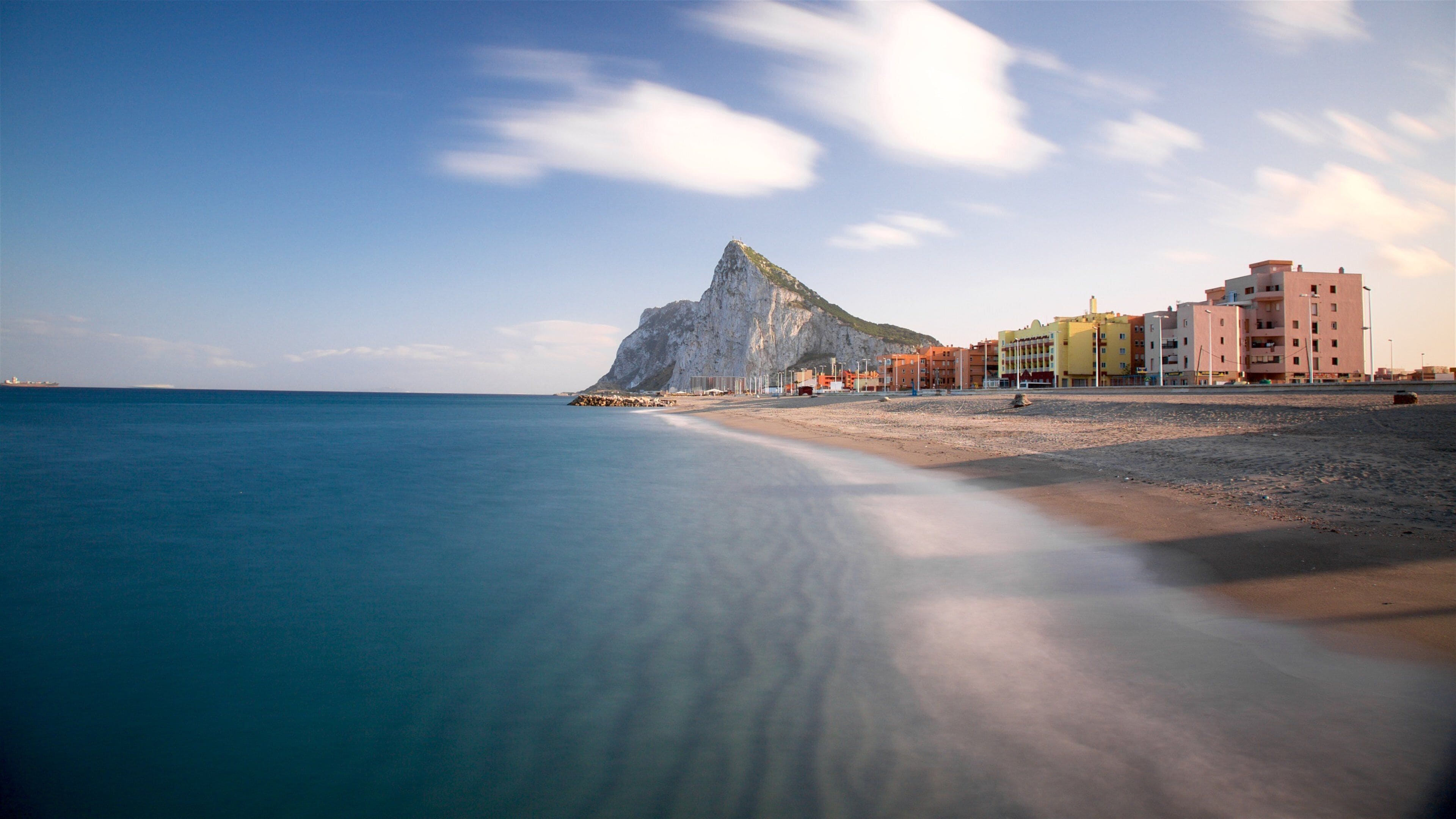 Rock of Gibraltar featuring a beach, general coastal views and mountains