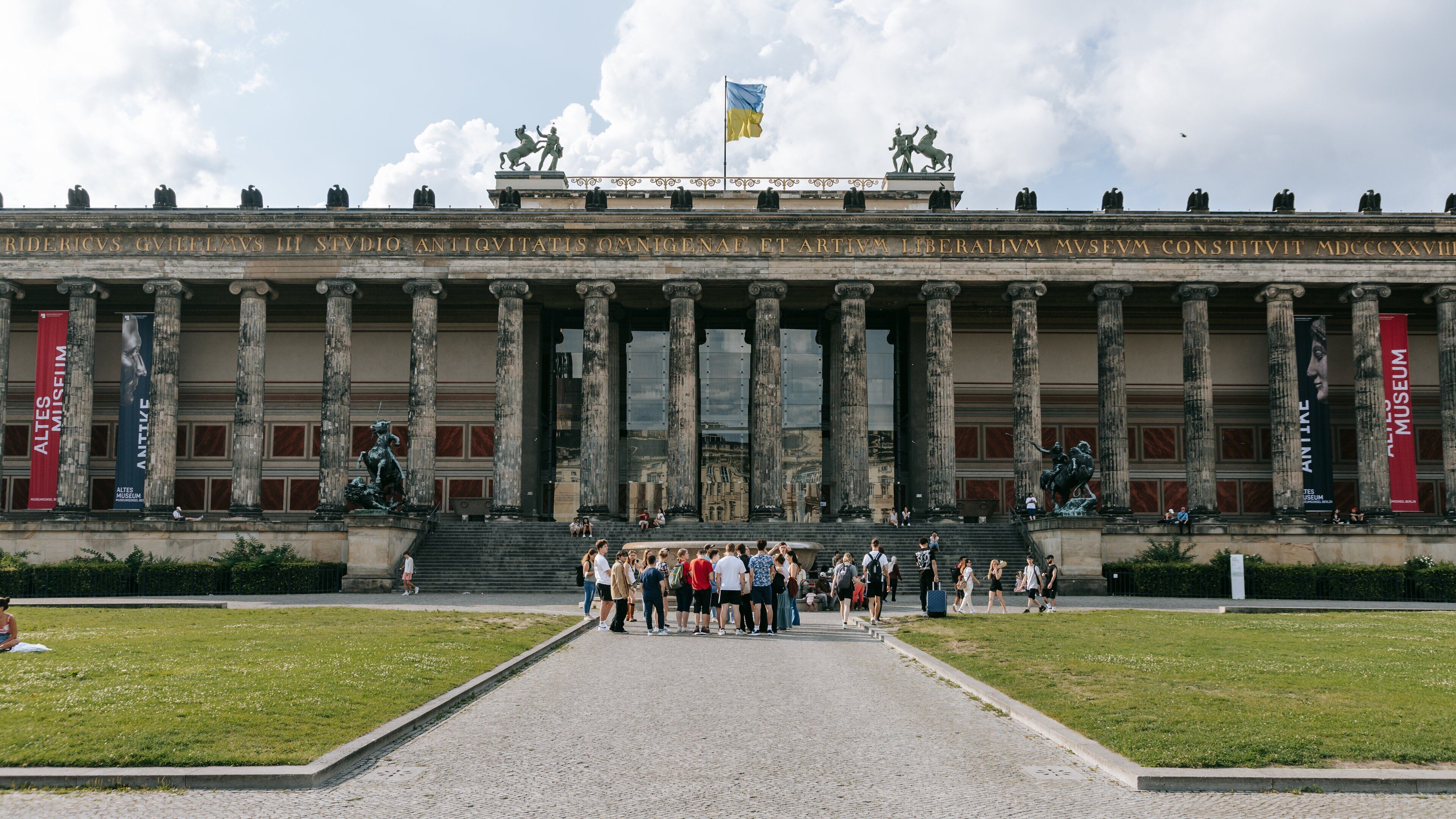 Museum Island featuring heritage architecture as well as a small group of people
