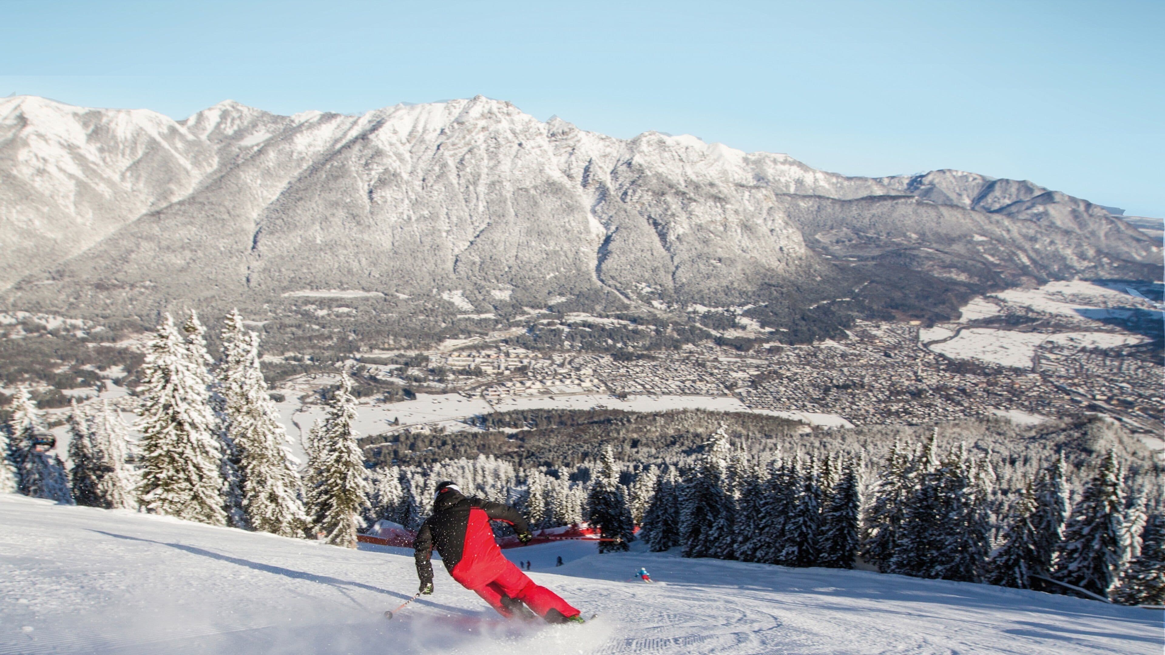 Garmisch-Partenkirchen Ski Resort which includes mountains, snow skiing and forest scenes