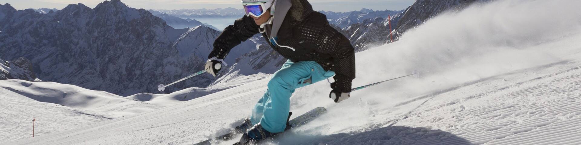 Garmisch-Partenkirchen Ski Resort showing snow skiing and snow as well as an individual female