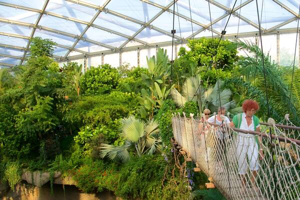 Leipzig Zoo featuring a bridge and interior views as well as a small group of people