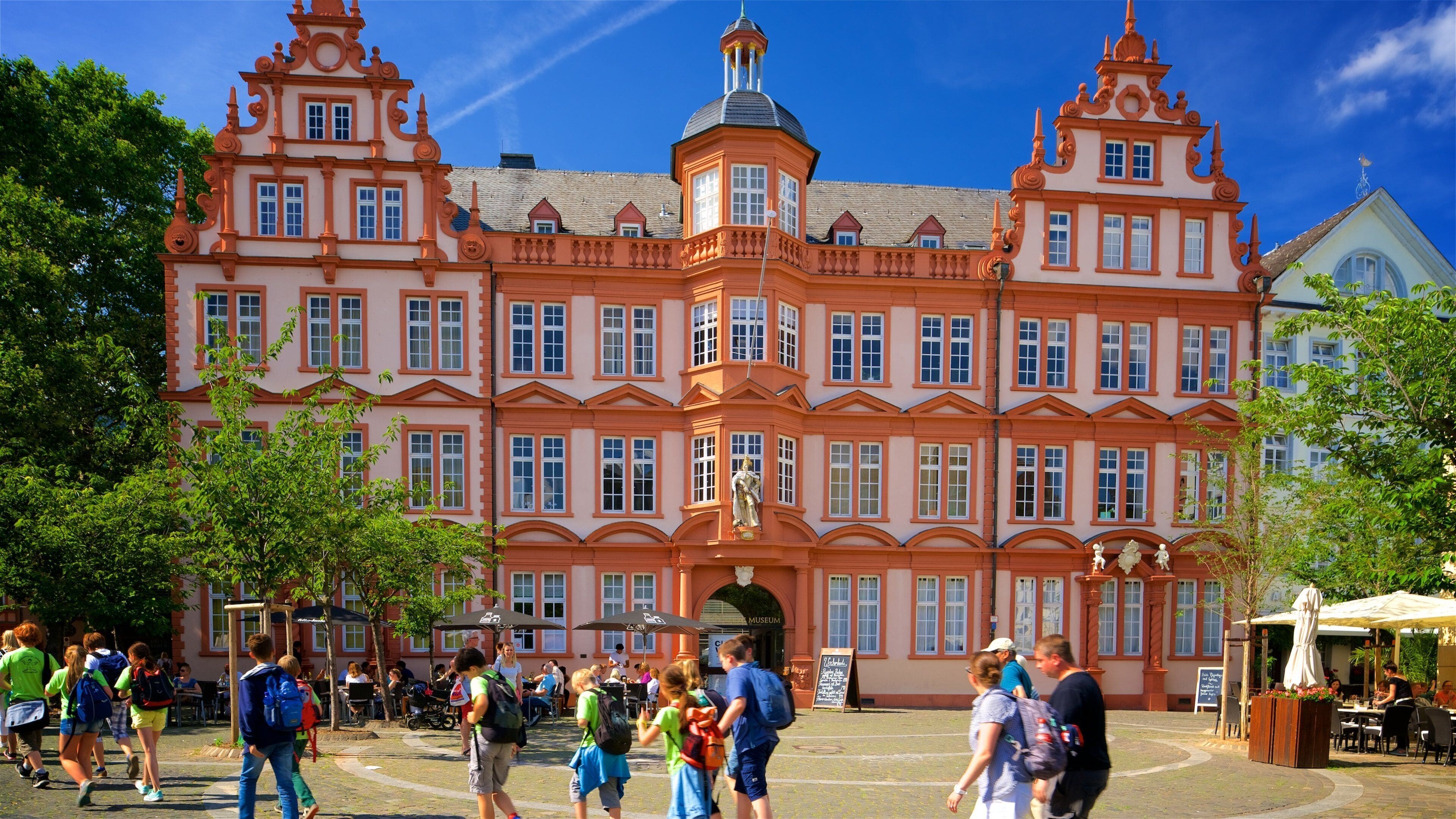 Gutenberg Museum featuring heritage architecture as well as a small group of people