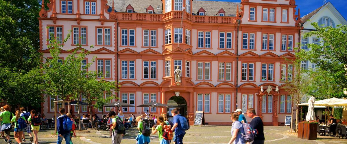 Gutenberg Museum featuring heritage architecture as well as a small group of people