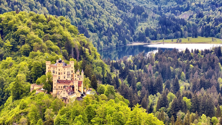 Majestic sunset at Hohenschwangau lake. Hohenschwangau castle. Bavarian alps in Germany