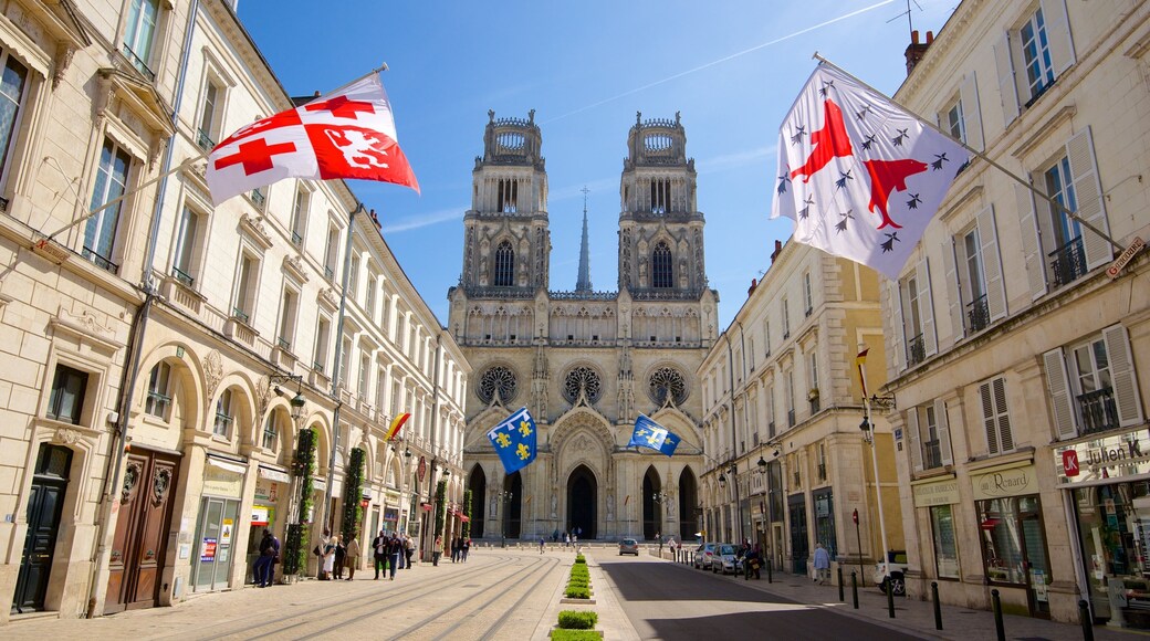 Sainte-Croix Cathedral showing street scenes, heritage architecture and a church or cathedral