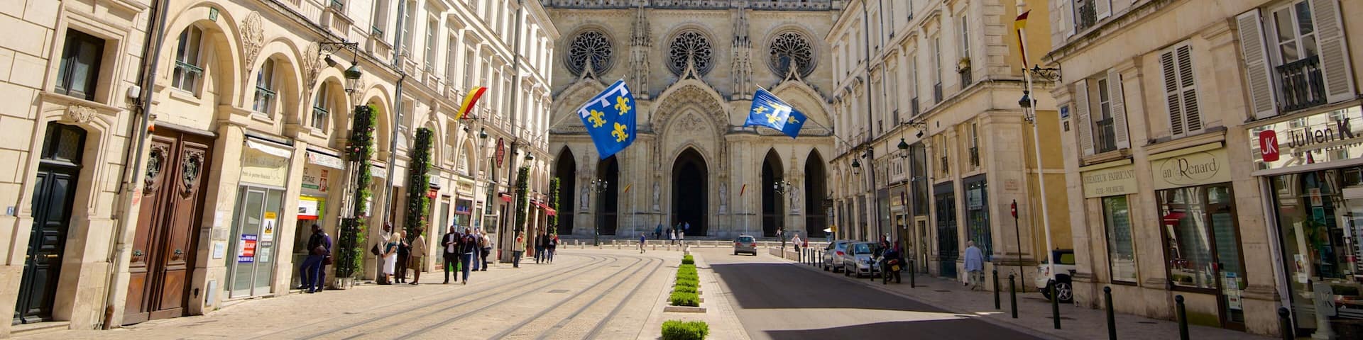 Sainte-Croix Cathedral showing street scenes, heritage architecture and a church or cathedral