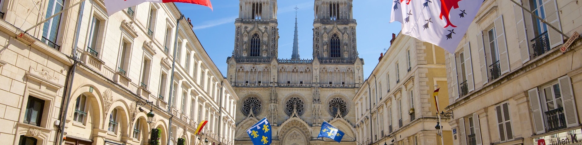Sainte-Croix Cathedral showing street scenes, heritage architecture and a church or cathedral