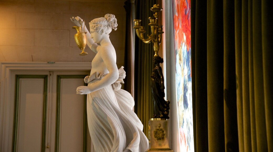 Chateau de Valencay which includes a statue or sculpture, interior views and chateau or palace
