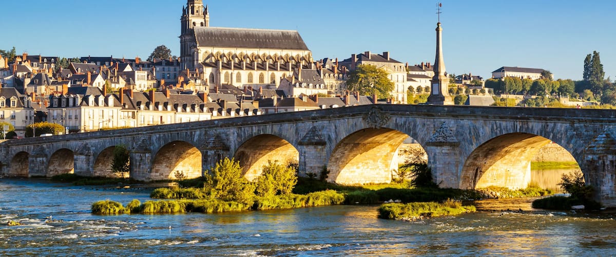 Old stone bridge over the Loire at sunset in Blois, France. Cathedral of Blois in the background., Shutterstock ID 593165978, SF SSA Case with Manager Approval: Case 07151371, Job: Prepay credit, Clie