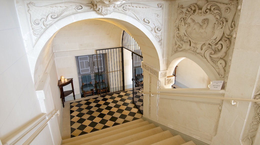 Chateau de Cheverny which includes interior views and a castle